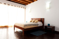 each houses has a master bedroom with a bed fit for a king